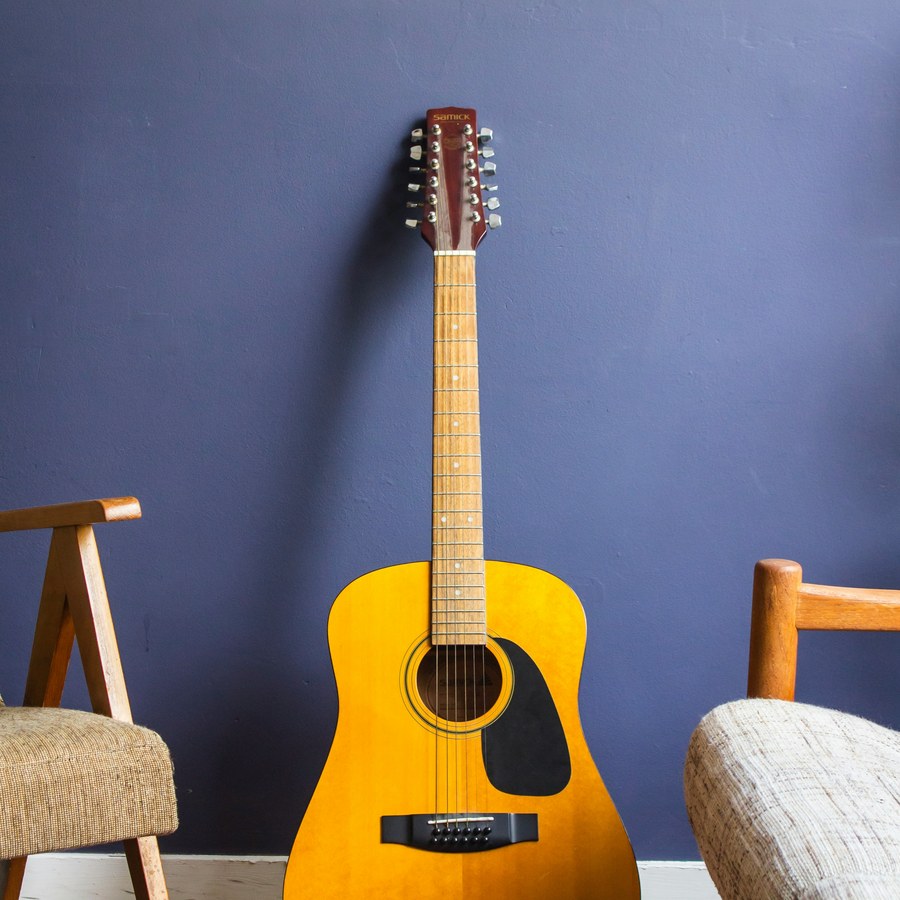 Acoustic guitar on a studio chair